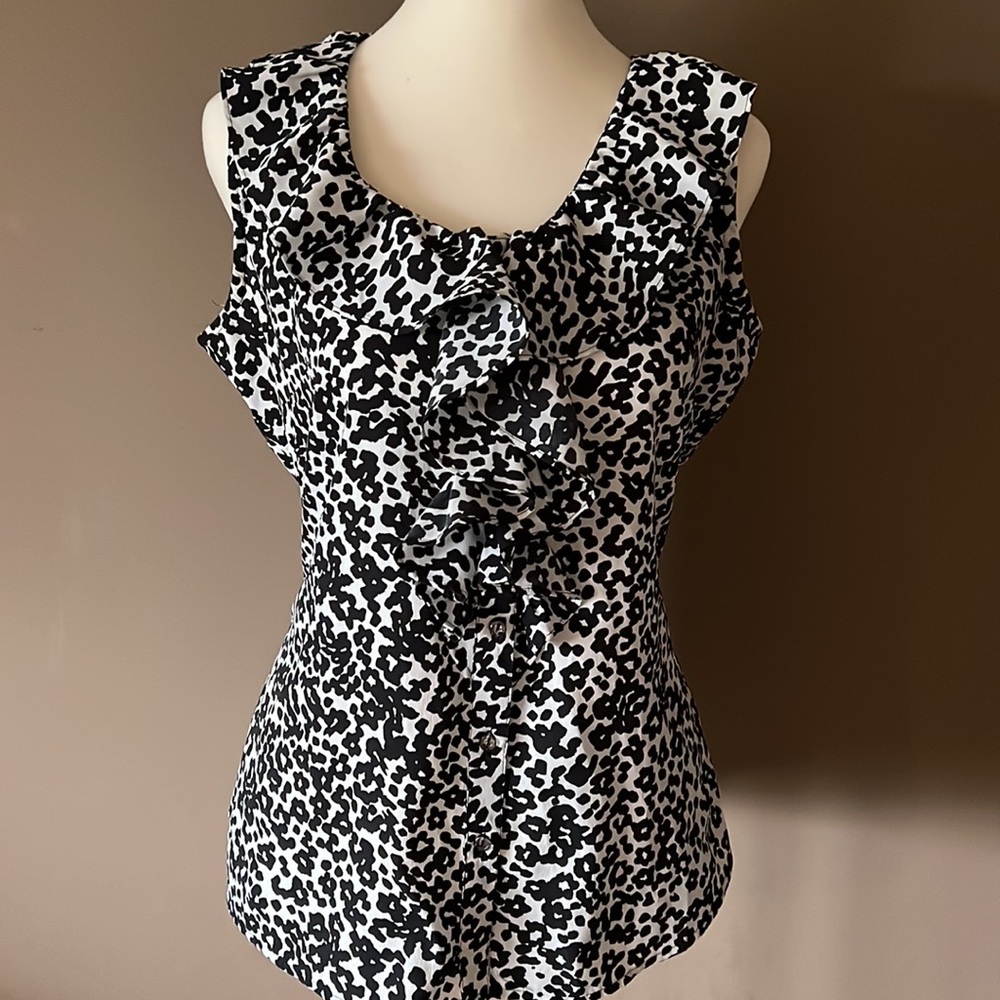 Black and white button down ruffled front blouse